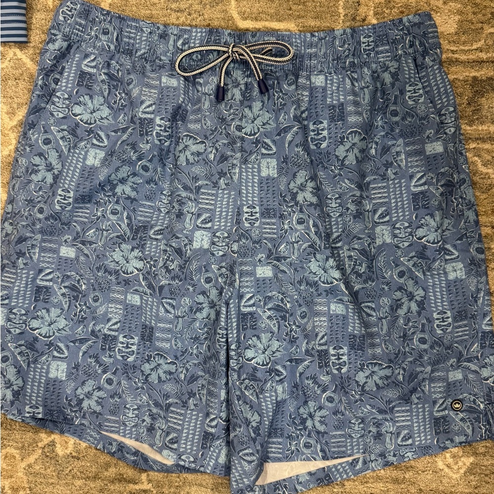 Peter Millar Blue Floral Swim Trunks New Without tag. Comes with a koozie!